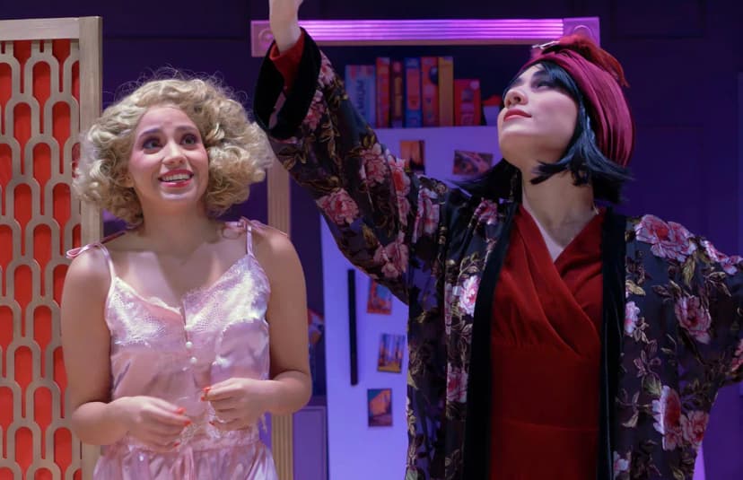 Students on the stage performing - moment from a Drowsy Chaperone show