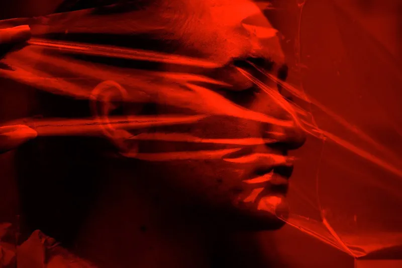 student art work of a person with red waves 