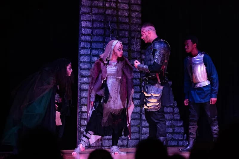 Students performing on the stage 